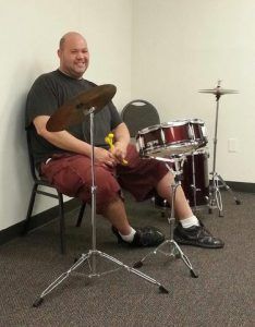 Man drumming.