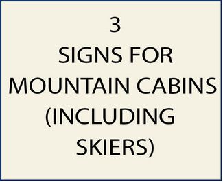 3.  Signs for Mountains Cabins, including Skiers
