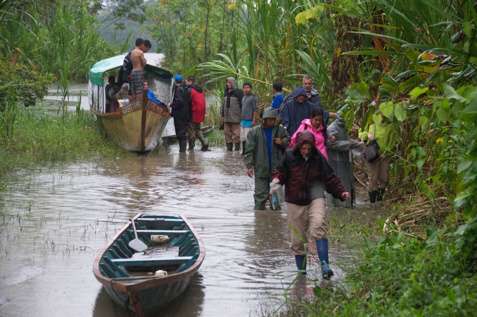 boat on a river with volunteers