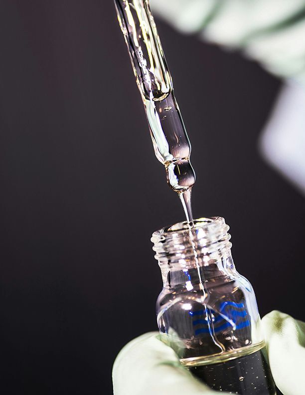 Close up of syringe in vial