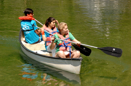 Three Campers in a canoe