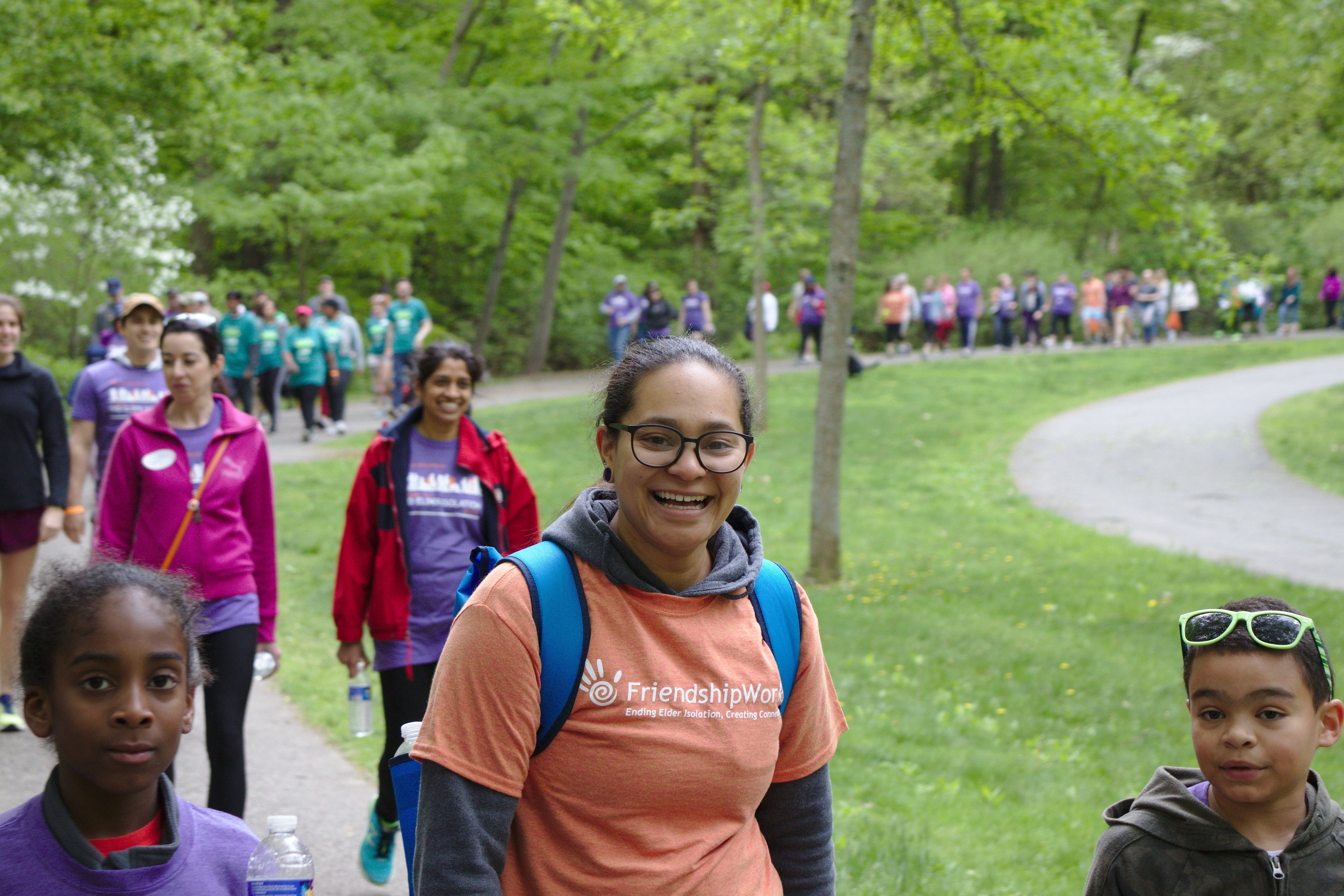 FriendshipWorks staff member with young walkers
