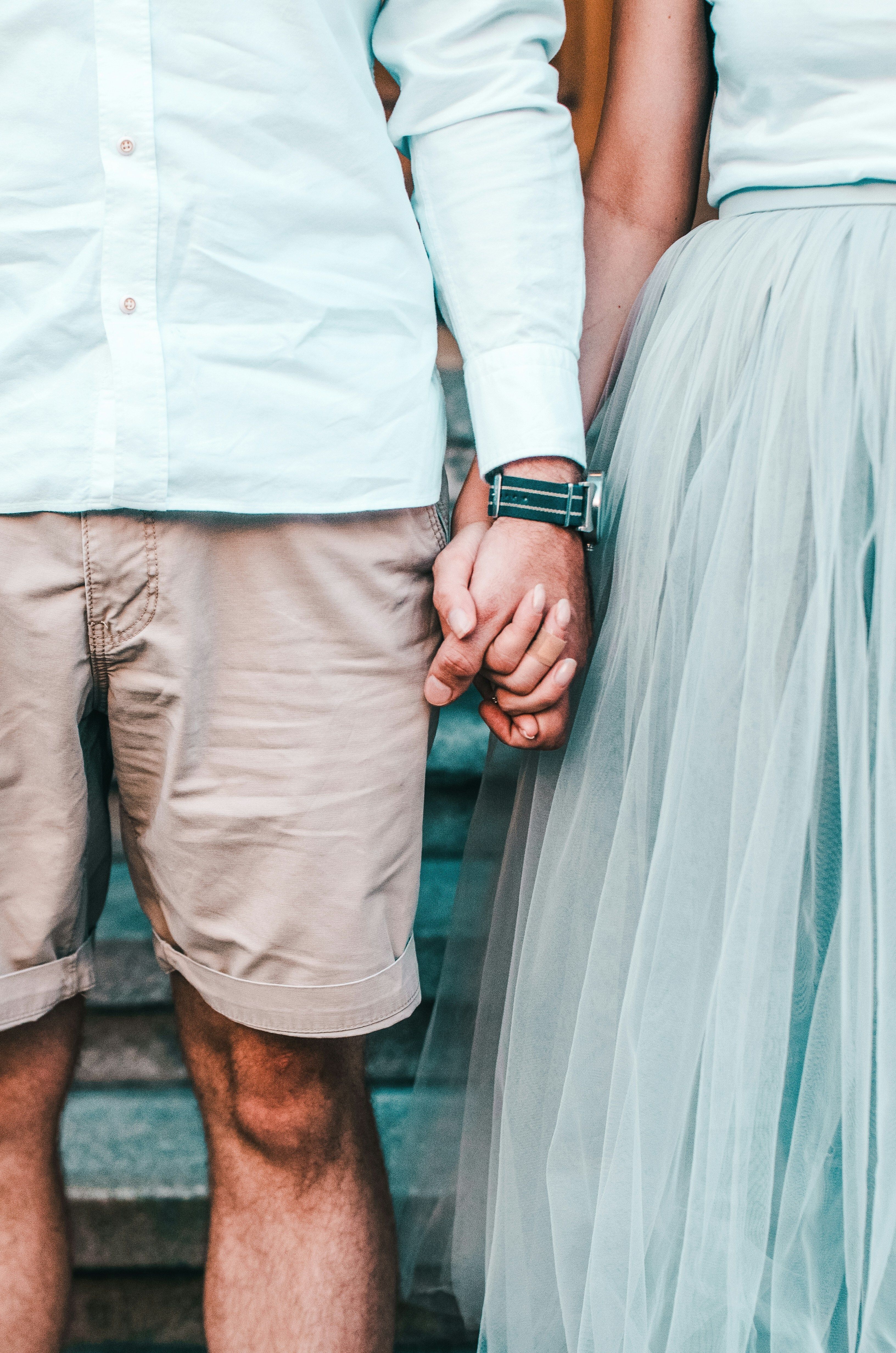 Couple holding hands