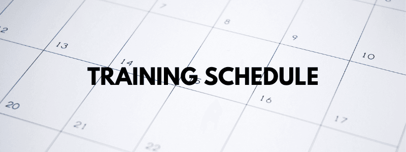 Image of calendar with text "Training Schedule"