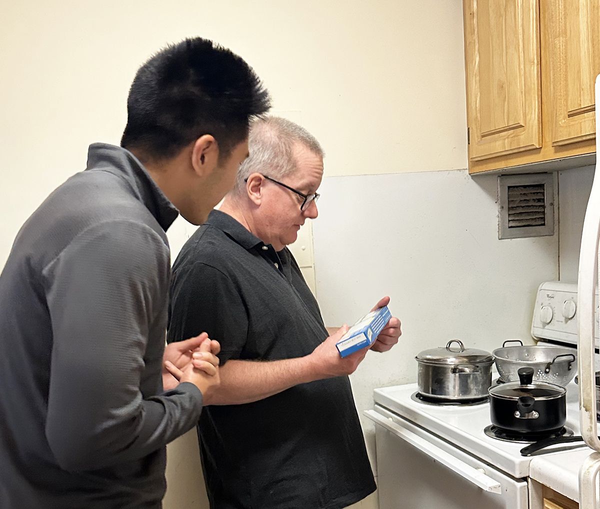 FriendshipWorks Friendly Visiting match David and Phillip in the kitchen.
