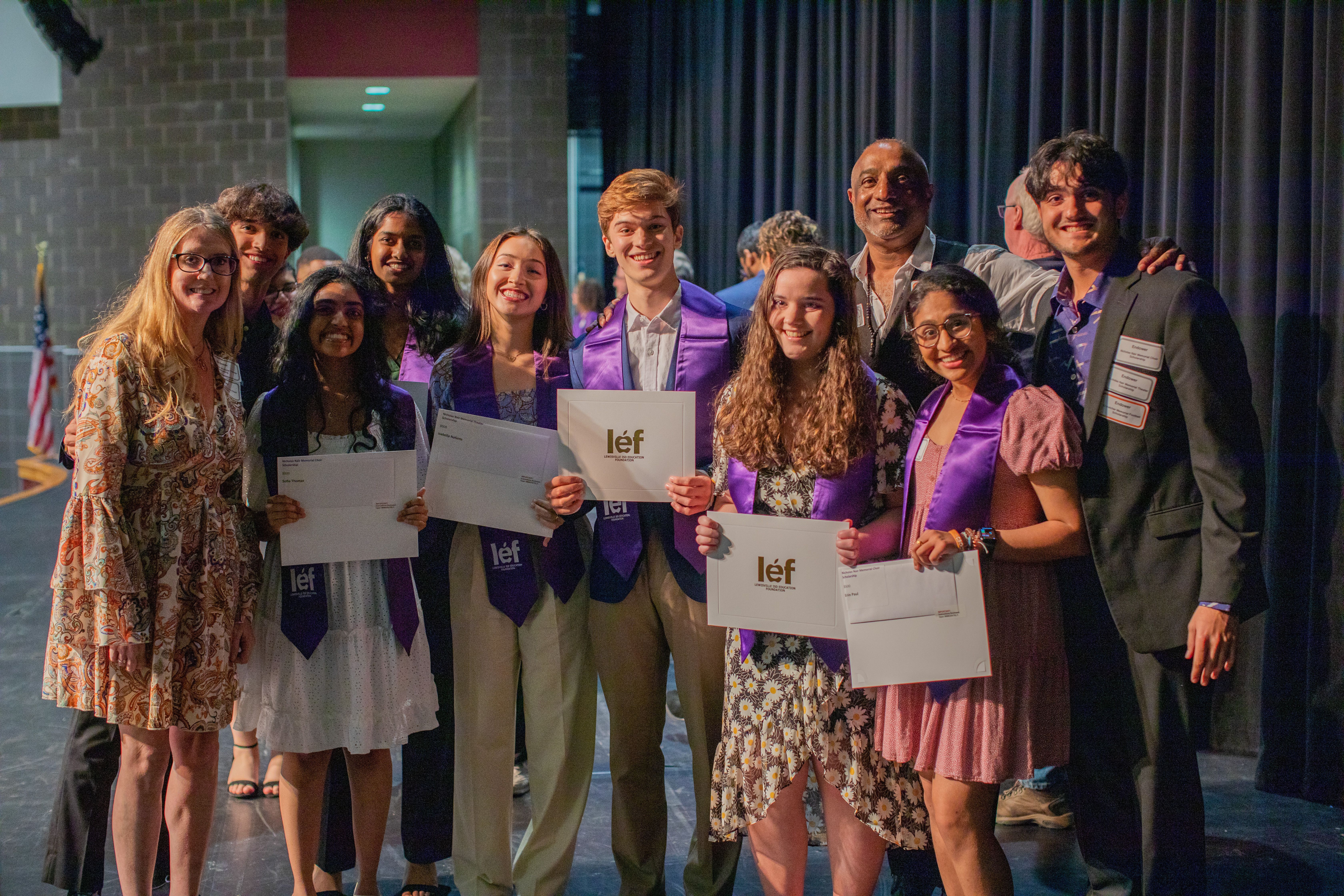 Students posing with the endower at the 2023 awards ceremony.