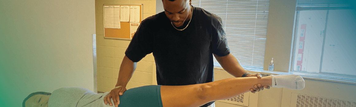 man providing physical therapy treatment