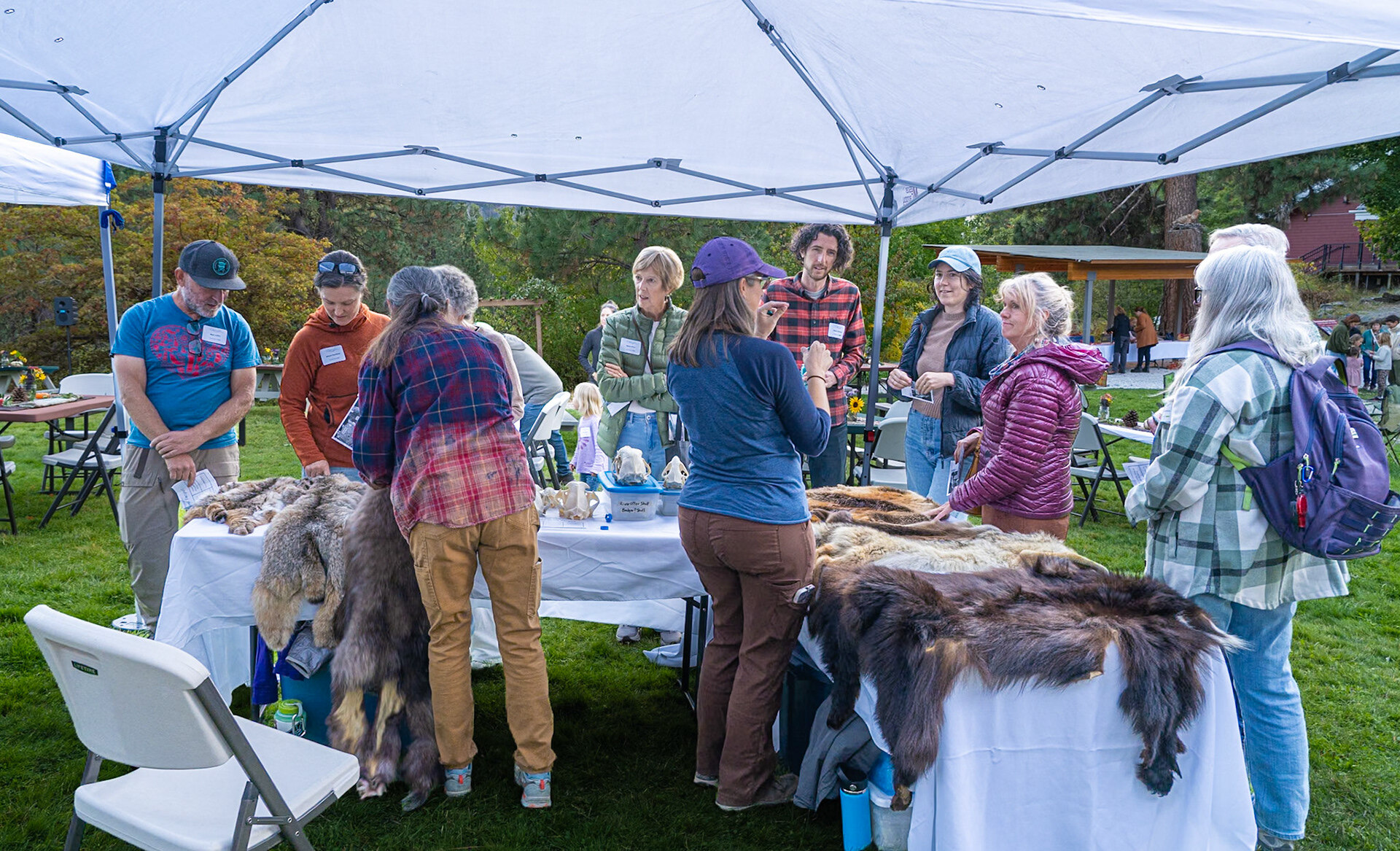 Skins & Skulls activity table at Sunset & S'mores 2026. Photo by Dave Masuda.