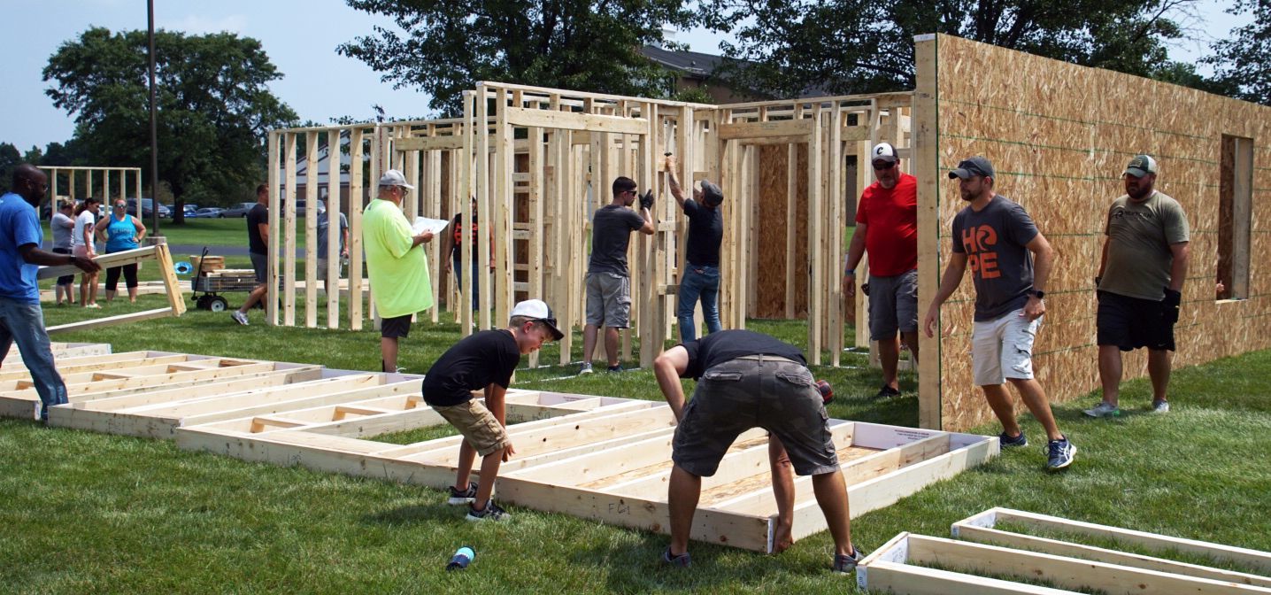 Volunteers from BeHope church build the walls for the home of a Dayton Habitat partner family.