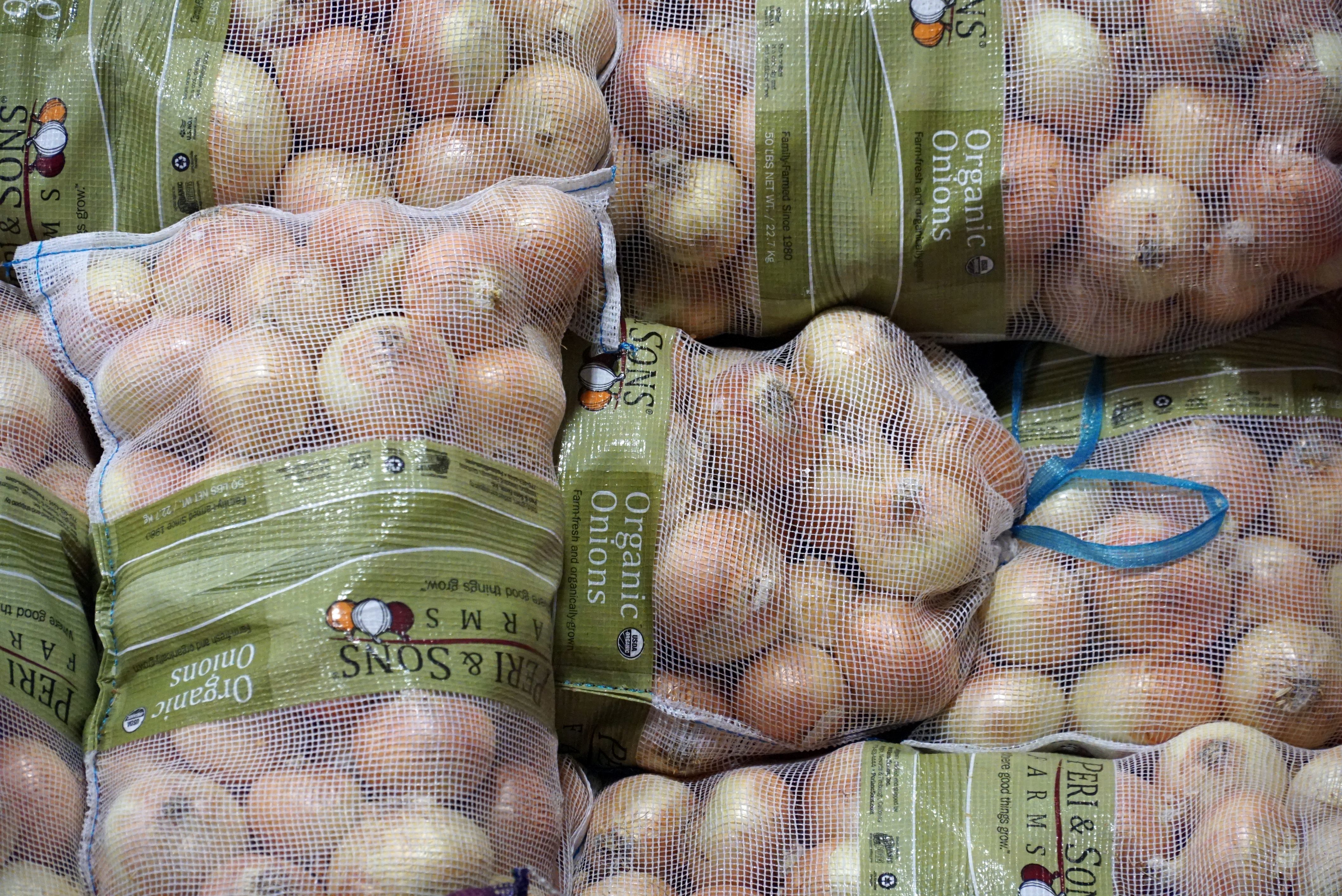 Background image of bags of onions