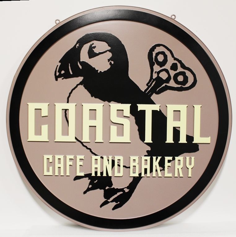 L21643 -Carved Round HDU Sign, "Coastal Cafe and Bakery” , with a Bird as Artwork.