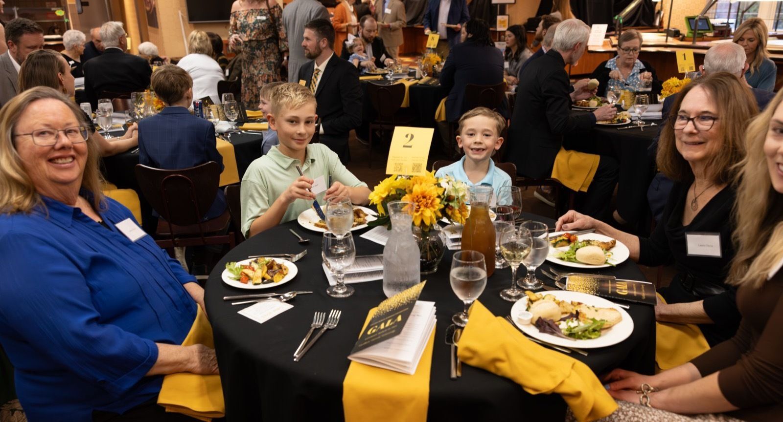 Families and supporters at dinner during the 2025 Gala