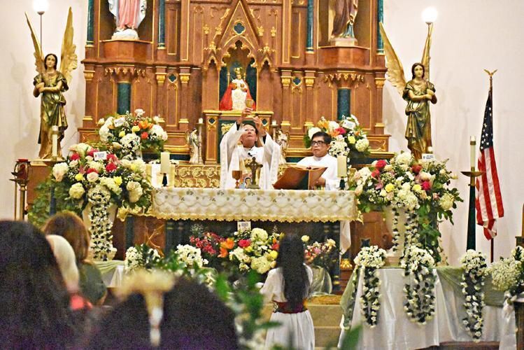 Father John Mericantante, left, and Father Raúl Cárdenas celebrate evening Mass Sept. 8, 2025, for the Nativity of the Blessed Virgin Mary.