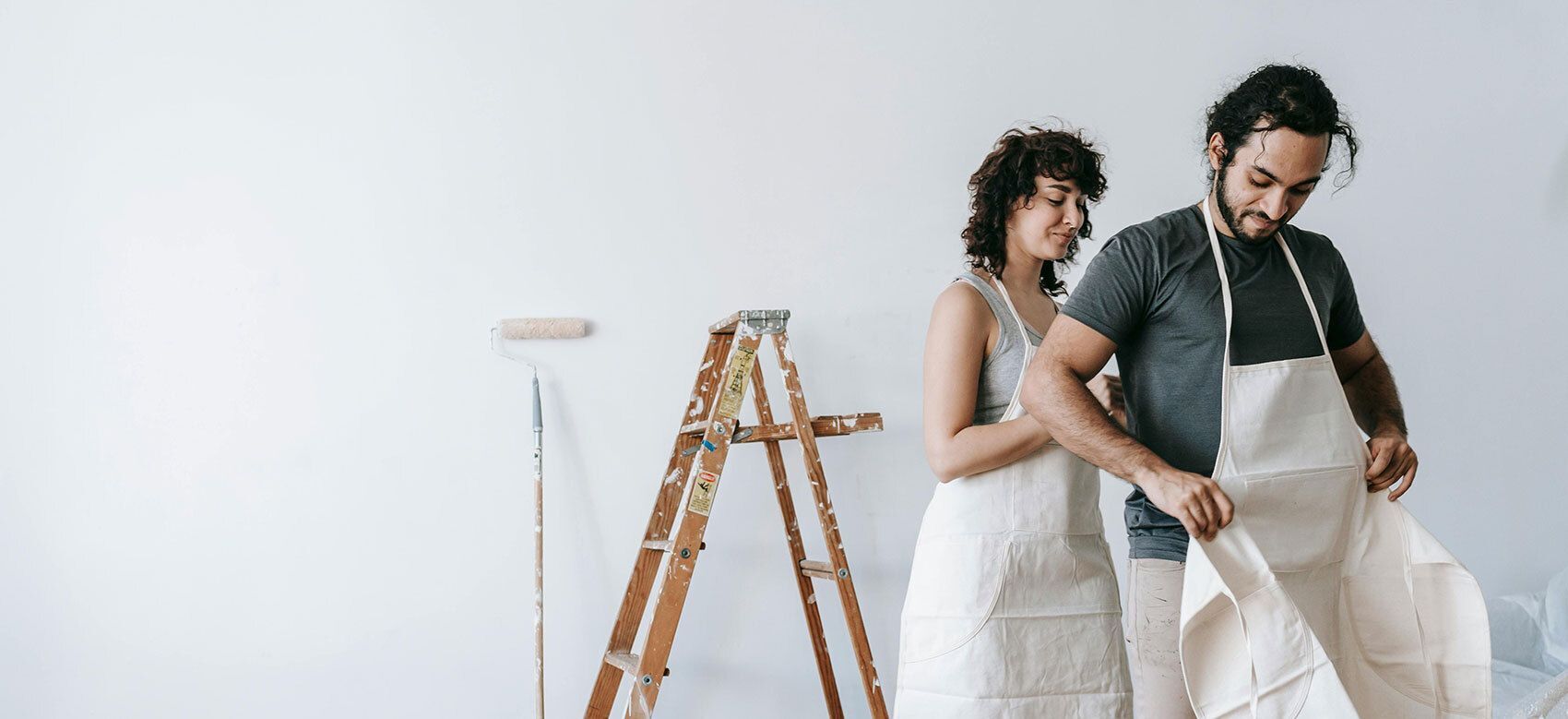 Two people getting ready to paint