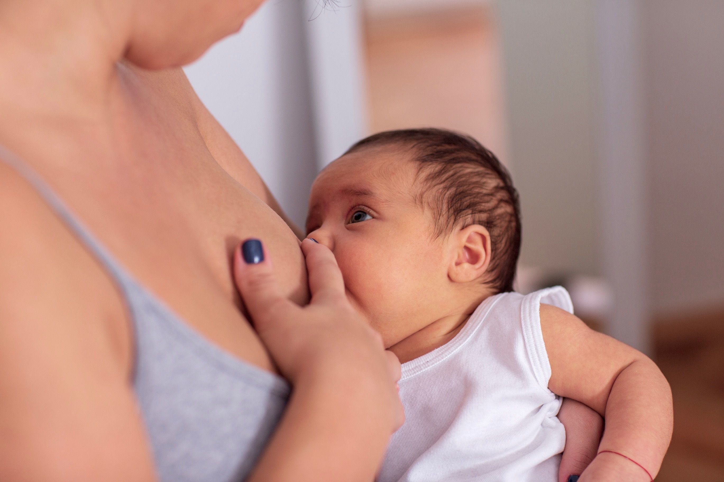 Mother breastfeeding baby