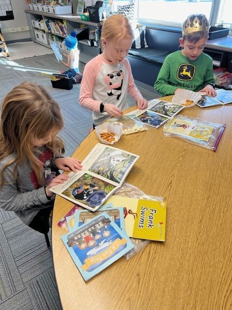 Students reading books in classroom