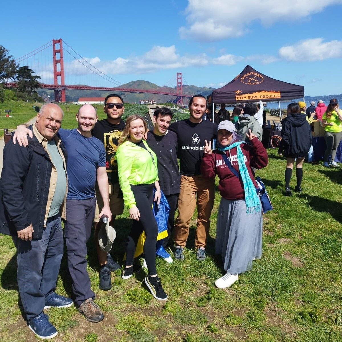 Group at Crissy Field in front of the Golden Gate Bridge for Zero Waste Fest 2024.