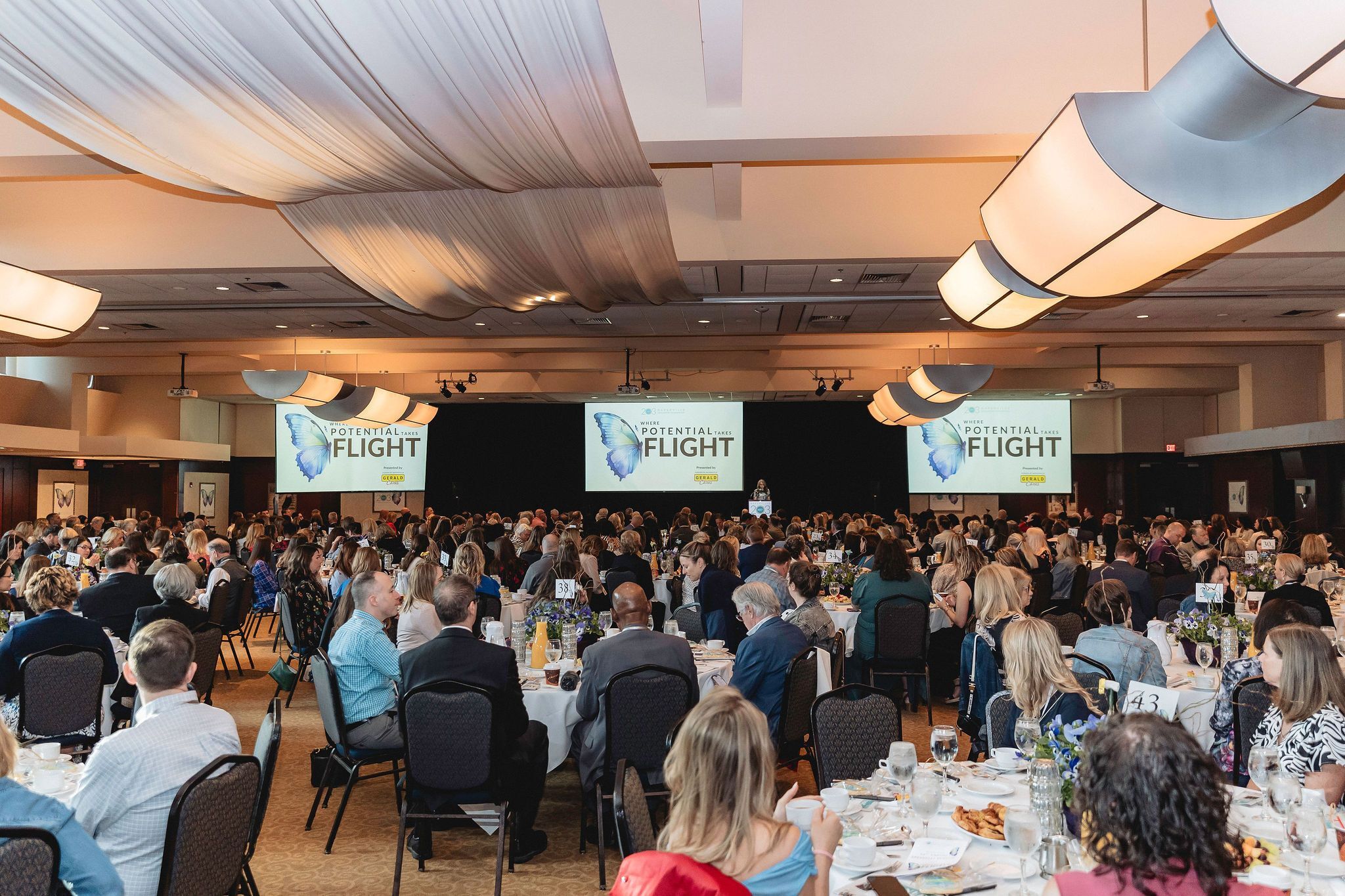 Image of a butterfly with text that reads "33rd Annual Breakfast Benefit Where Potential Takes Flight"