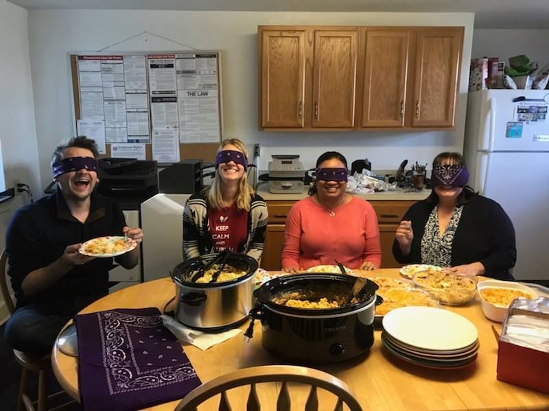 AWP staff members enjoy a mac 'n cheese cook-off.