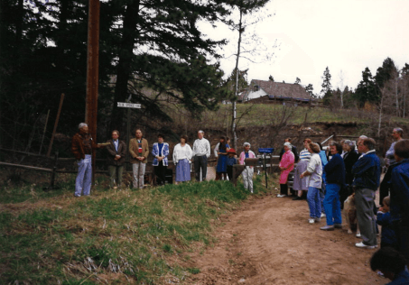 Group commemorating Blue Spruce Habitat's first build