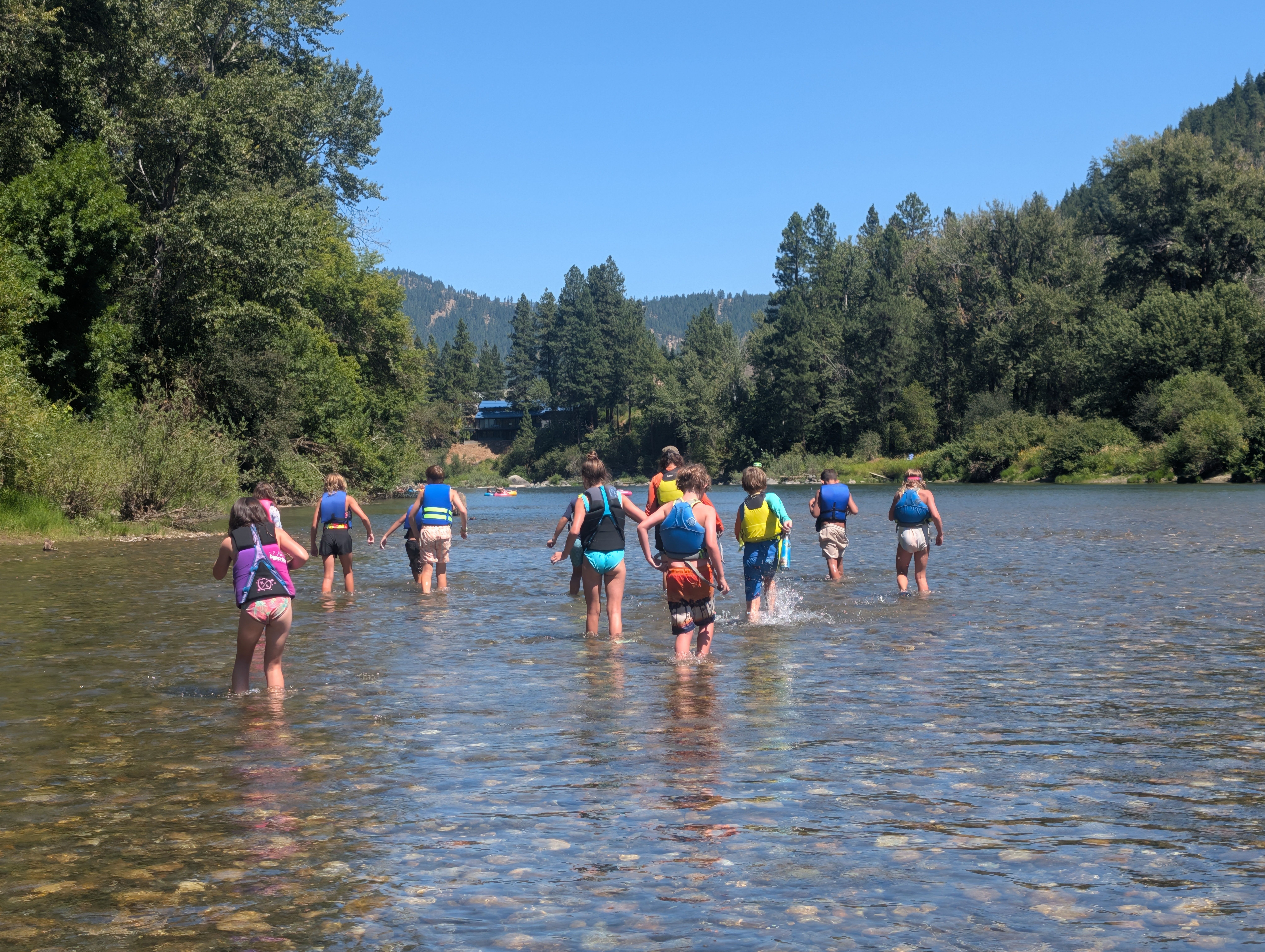 River Wild 2 Camp (entering 4th-6th grade) 2026 walking through the river during Summer Camp