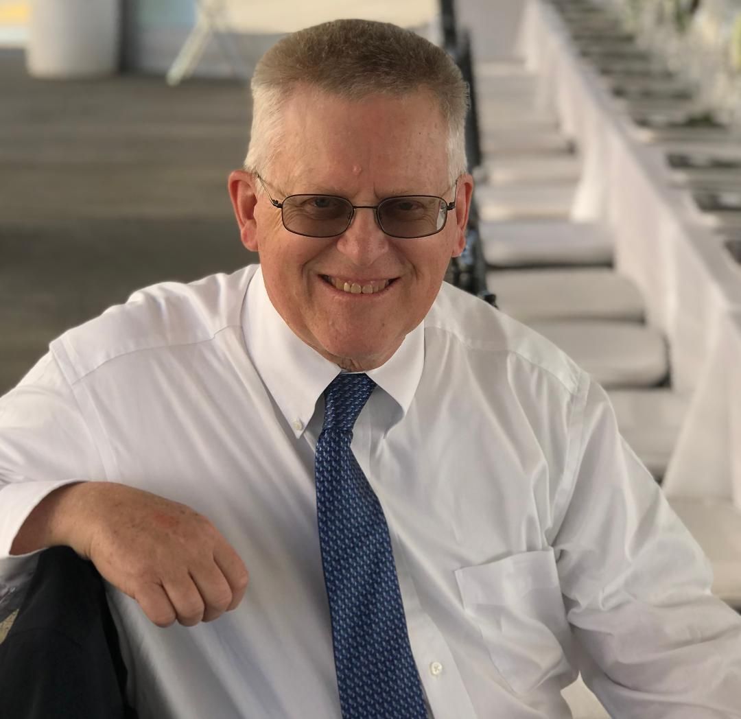 photo of Dave Thoits in white shirt with dark tie