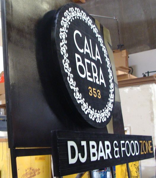 Q25735 - Side View of Cala Bera Restaurant and Bar Entrance Sign