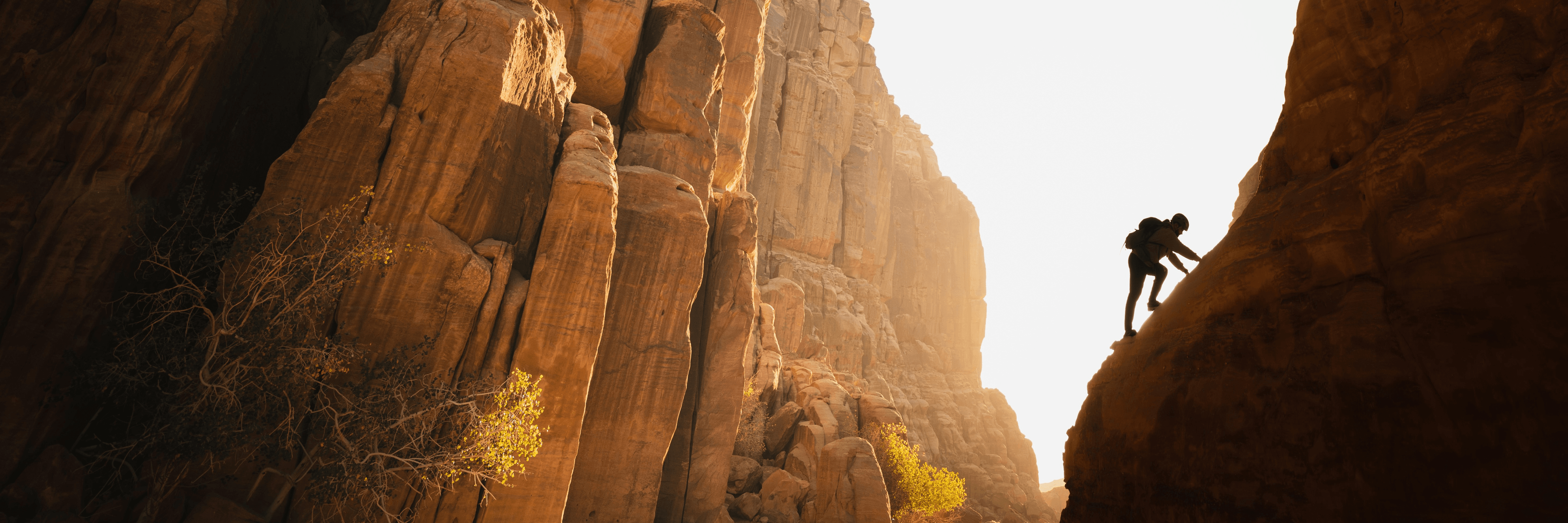 Person rock climbing in the desert