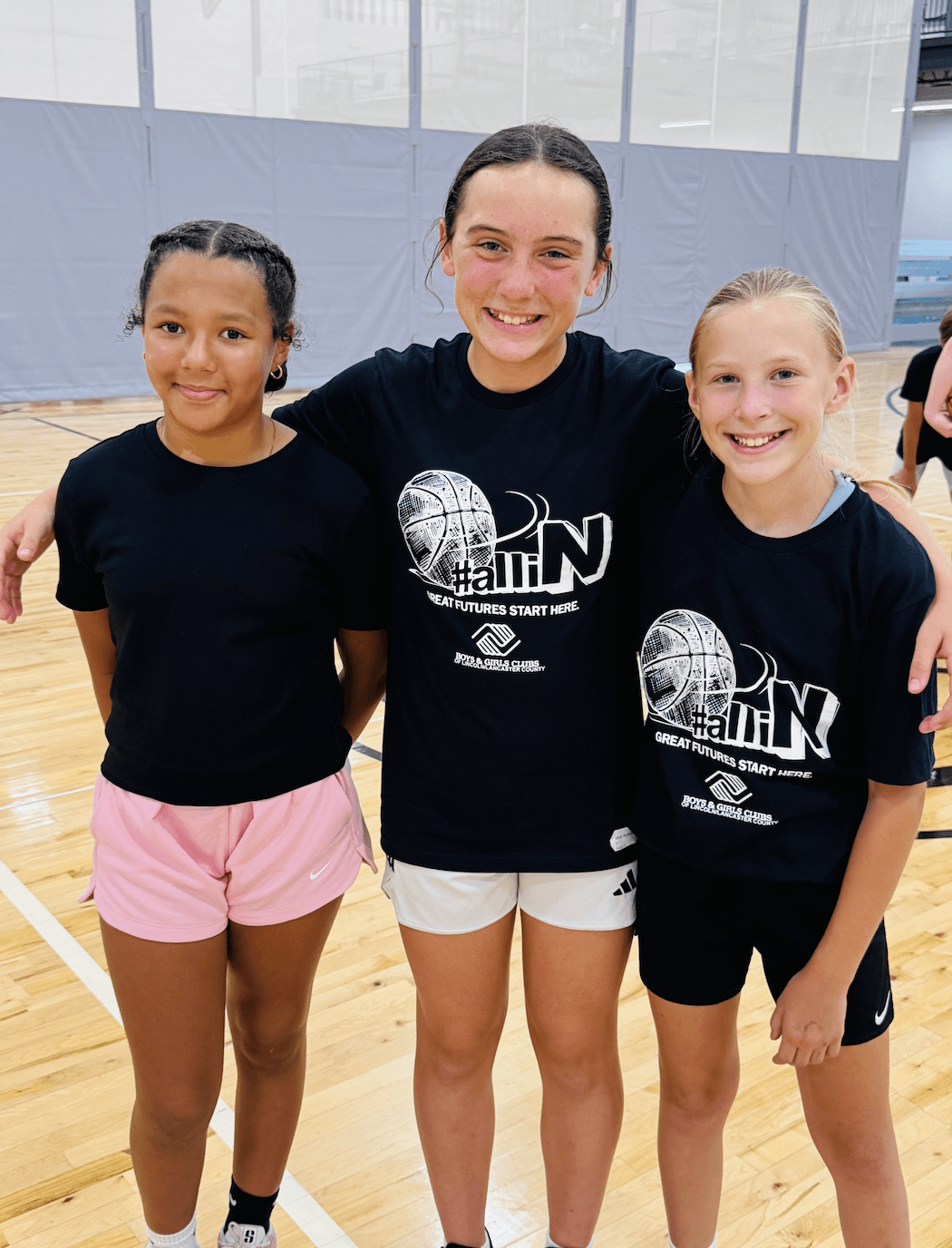 Person Looking at a Book from Library Shelf