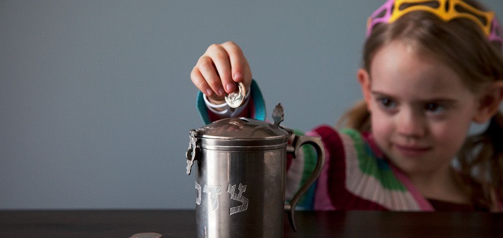 Cute girl sipping soup