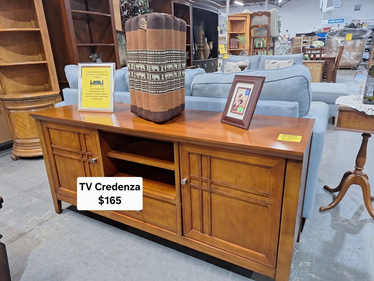 Sturdy wood TV credenza with ample storage space and center shelf, ideal for living room entertainment setup – $165 at Habitat ReStore Zephyrhills