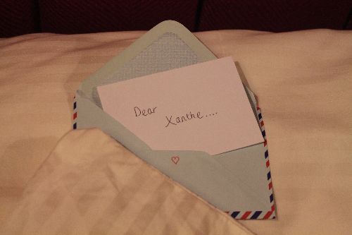 Photo of a note in an envelope that reads "Dear Xanthe..."