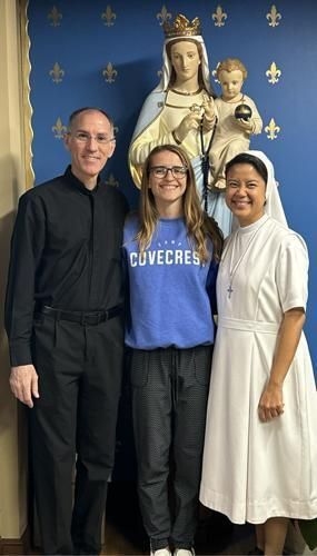 Ashlie O'Brien with two of her mentors, Father Gavin Badway and Salesian Sister Elfie Del Rosario.