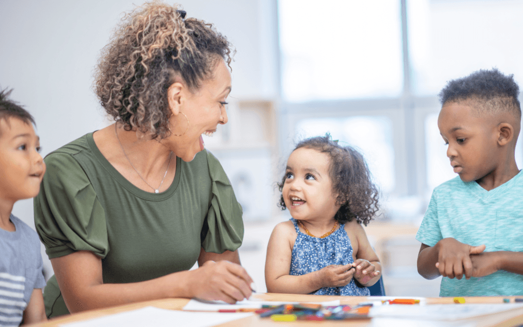 Woman teaching in preschool classroom