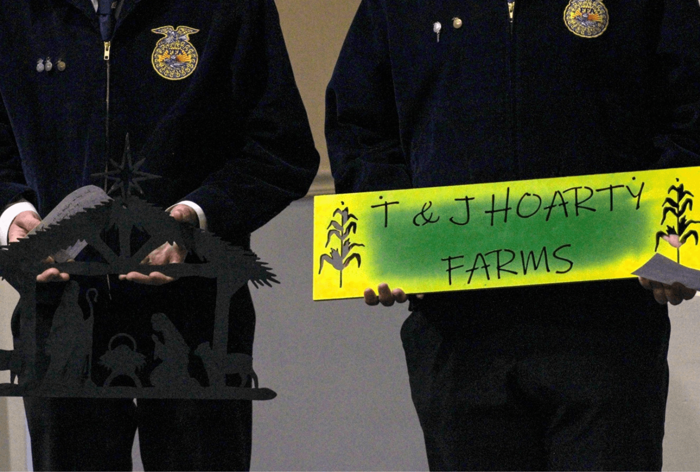 Raymond Central FFA students give their final Launch! pitch at state convention, featuring a custom cut metal sign.
