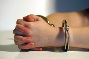 Juvenile's hands in handcuffs