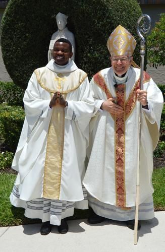 Newly ordained Father Jude Okeke stands with Bishop Gerald M. Barbarito following his ordination to the priesthood May 3, 2025.  WILLIAM CONE | FC