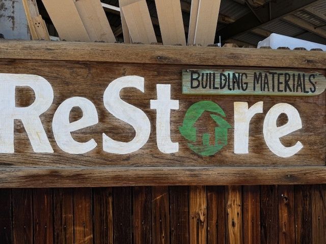 Blue Spruce Habitat ReStore signage