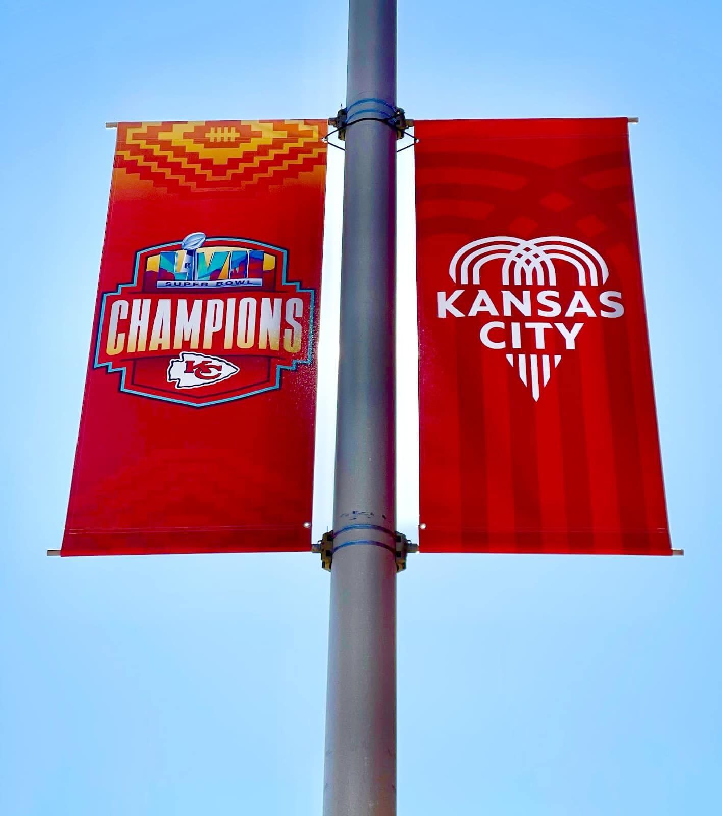 LVII Champion Pole Banner on Left with City of Fountains Banner on Right