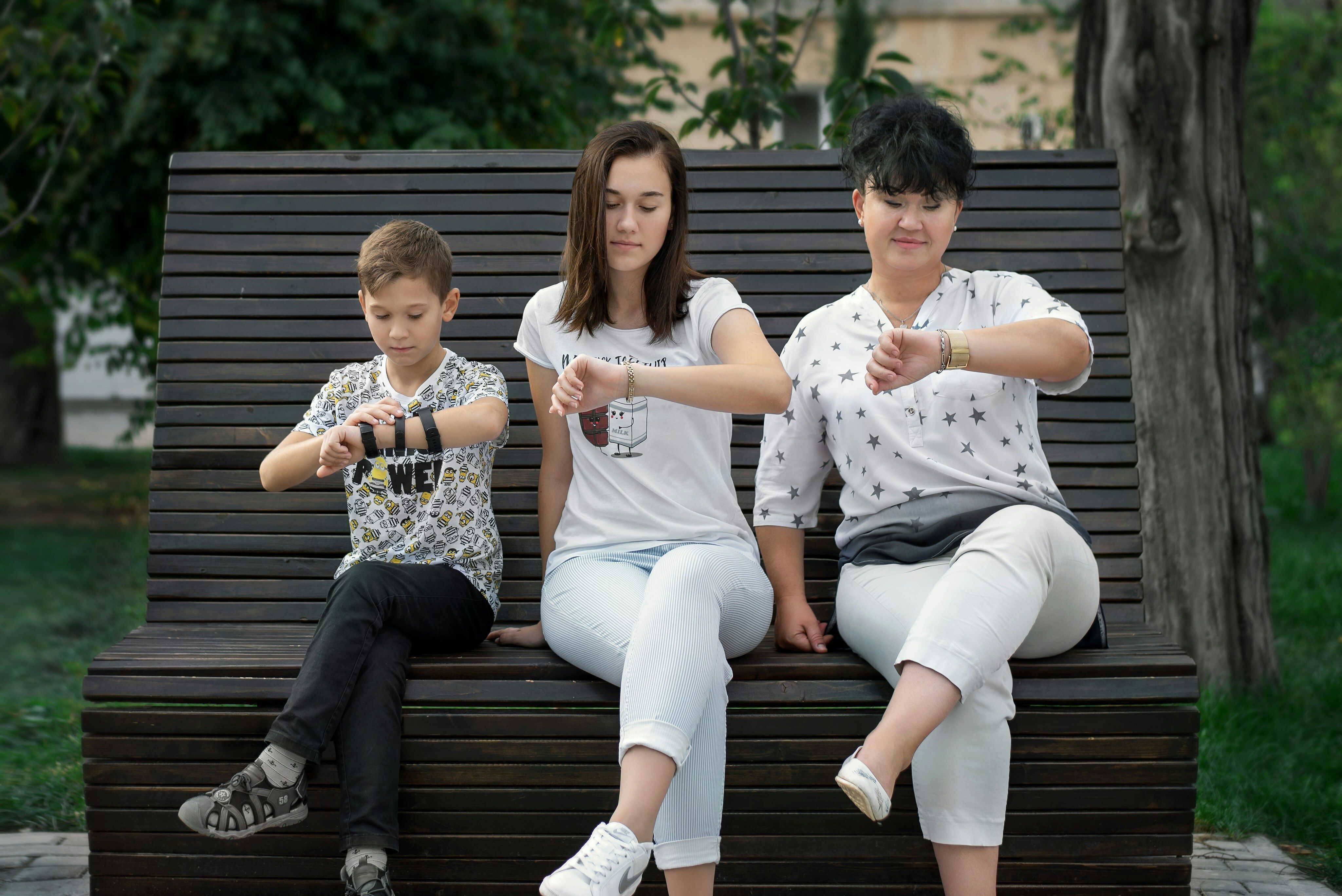 Kids looking at their watches