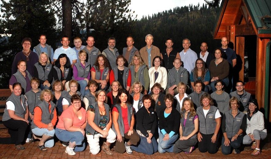 A group of people posing for a group photo