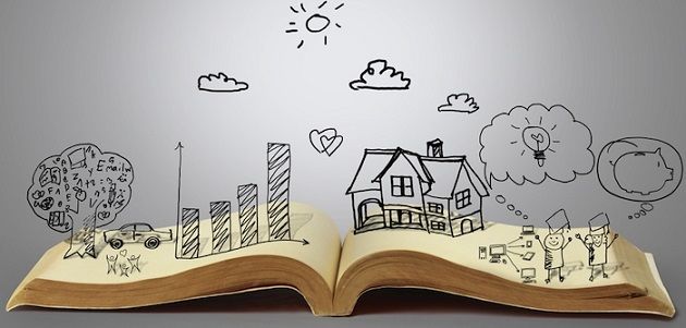 open book laying on white table with hand drawn graphics of trees, buildings, and people