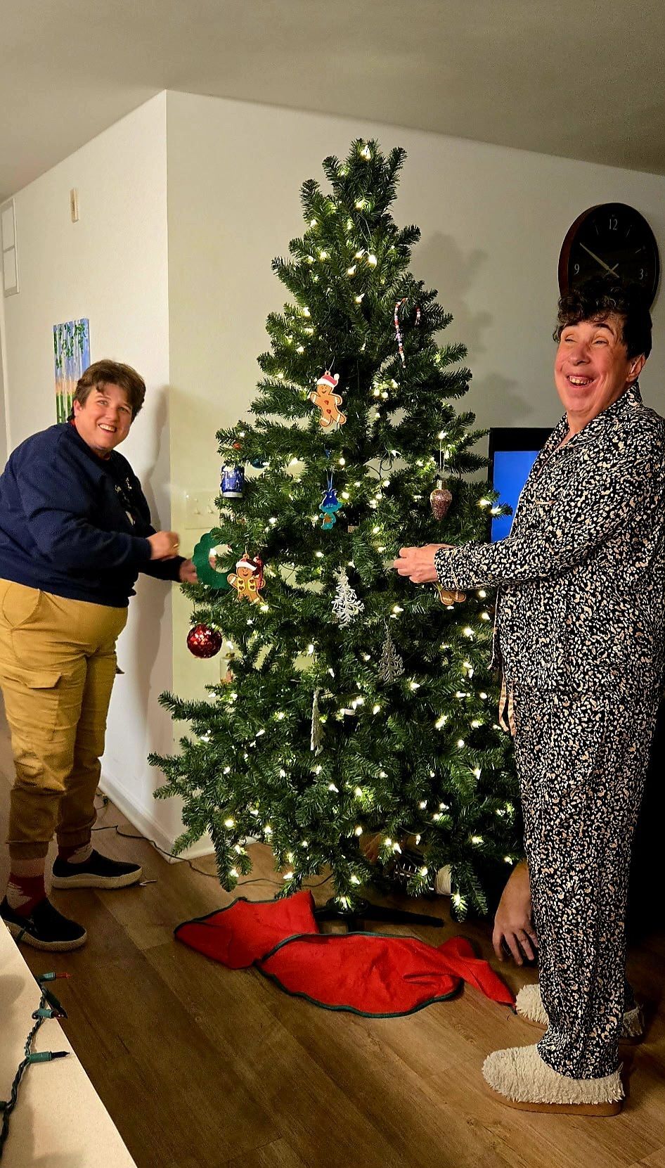 Residents decorating a Christmas tree