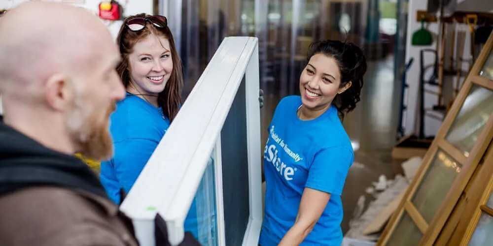 Volunteers accepting a donation at the Habitat ReStore in Zephyrhills, Florida, supporting affordable housing in East and Central Pasco County.