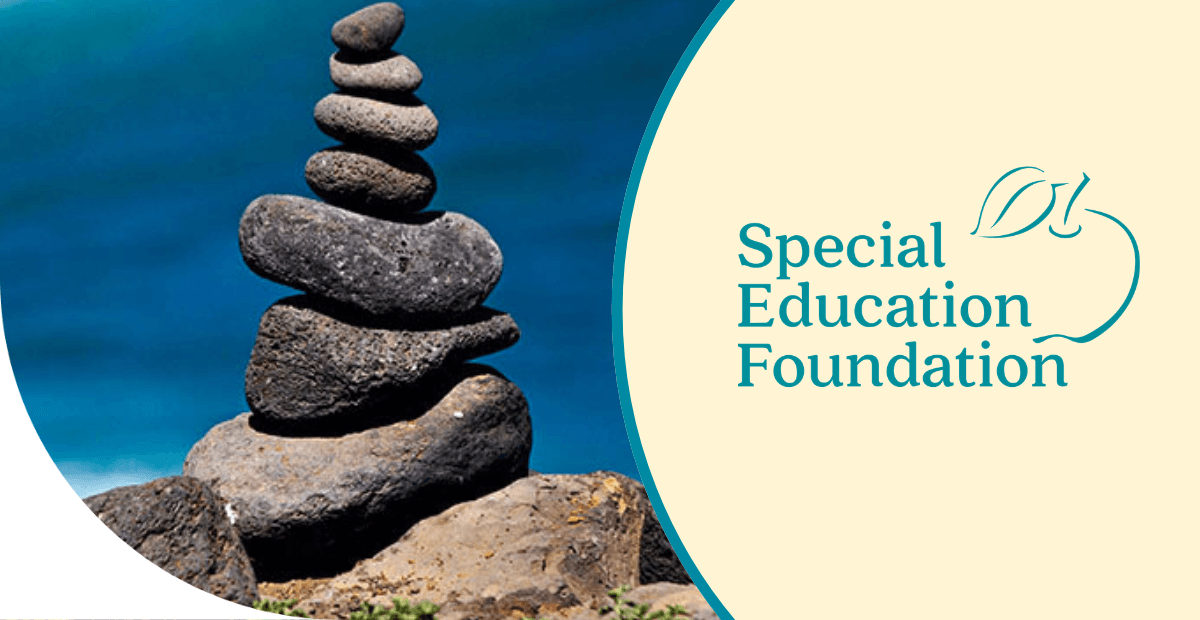 stacked rocks on ocean background