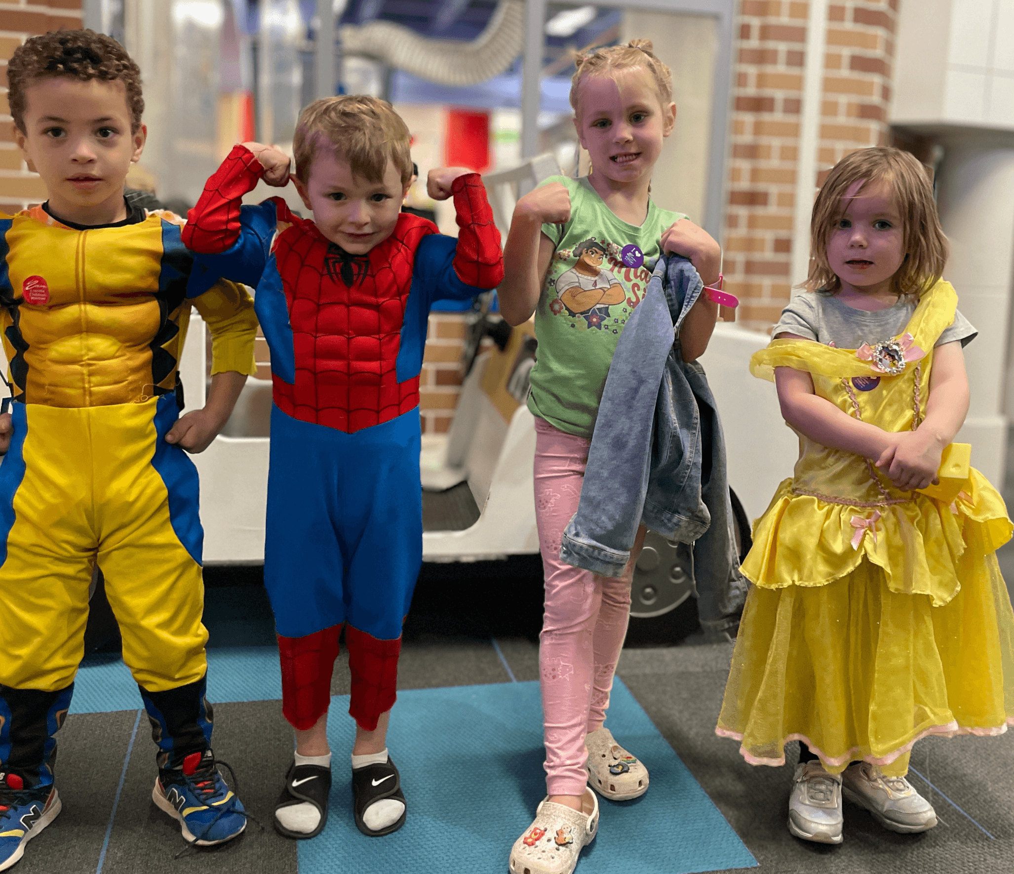 Toddlers in astronaut costumes.