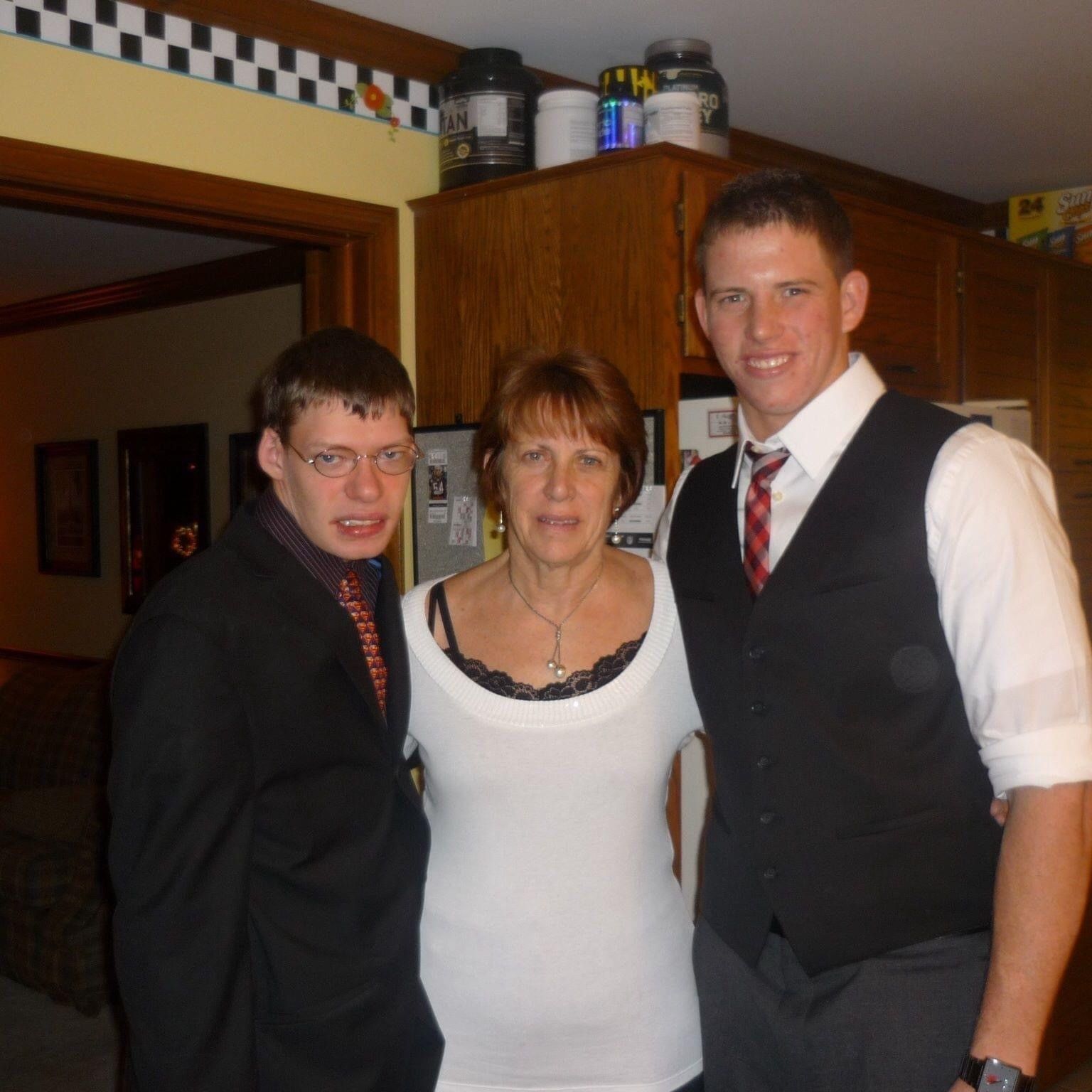 Mom standing with sons