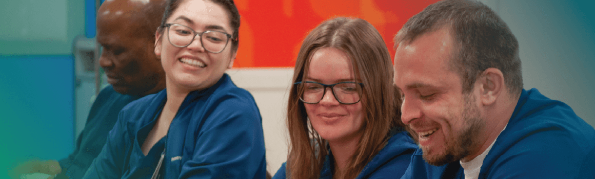 three nursing students smiling
