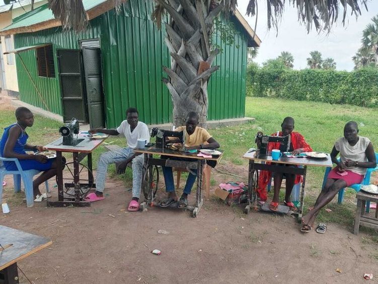 Sewing Outside Building