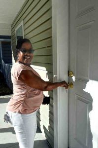Two families celebrate new Habitat homes